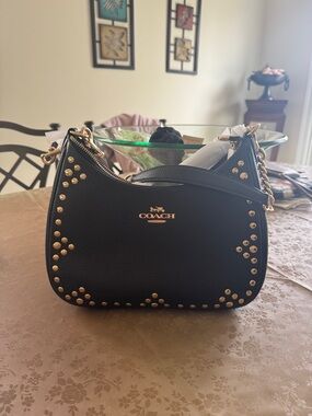 Coach Terri Hobo with Rivets